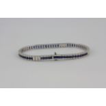 An 18ct white gold diamond and sapphire set bracelet, approx. 7.60ct of sapphires and 2.37ct of