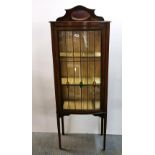 An Edwardian inlaid and leaded glass display cabinet, 56 x 152cm.