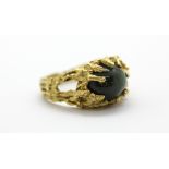 An H. Stern 18ct yellow gold (stamped 750) ring set with a large cabochon cut green tourmaline, (
