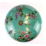 A Chinese hand enamelled porcelain circular box and lid, Dia. 25cm H. 15cm.