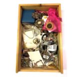 A box of mixed costume jewellery.