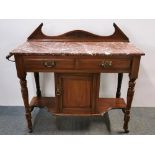 An Edwardian marble topped satin wood wash stand, W. 110cm, H. 95cm, (end rail present but