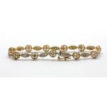 A 14ct yellow gold (stamped 585) diamond set bracelet, L. 16.5cm.