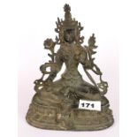 A Tibetan bronze figure of a seated Tara with remnants of gilding, H. 21cm.