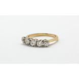 A yellow metal (tested 18ct gold) ring set with five brilliant cut diamonds, approx. 1.10ct overall,