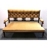 An attractive Victorian carved mahogany upholstered settee, W. 138cm.