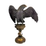 A large bronze figure of an eagle, H. 43cm.