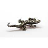 A rose and white metal (tested gold and silver) gecko shaped brooch set with rose cut diamonds and