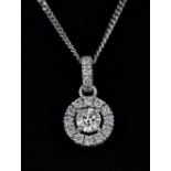 A 18ct white gold diamond set halo pendant set with a 0.59 centre brilliant cut diamond surrounded