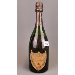 A bottle of Dom Perignon 1978 vintage champagne, sealed but part leached.