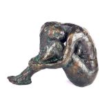 A superb cast bronze figure of a naked female, H. 20cm, L. 30cm.