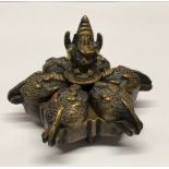 A 19th century Indian bronze / brass spice box, W. 8.5cm.