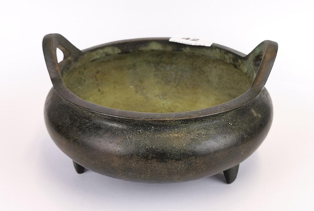 A 19th Century Chinese bronze censer, four character mark to base, W. 17.5cm H. 10cm.