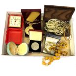 A box of mixed costume jewellery.