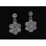 A pair of 18ct white gold (stamped 750) drop earrings set with brilliant cut diamonds, approx. 1.