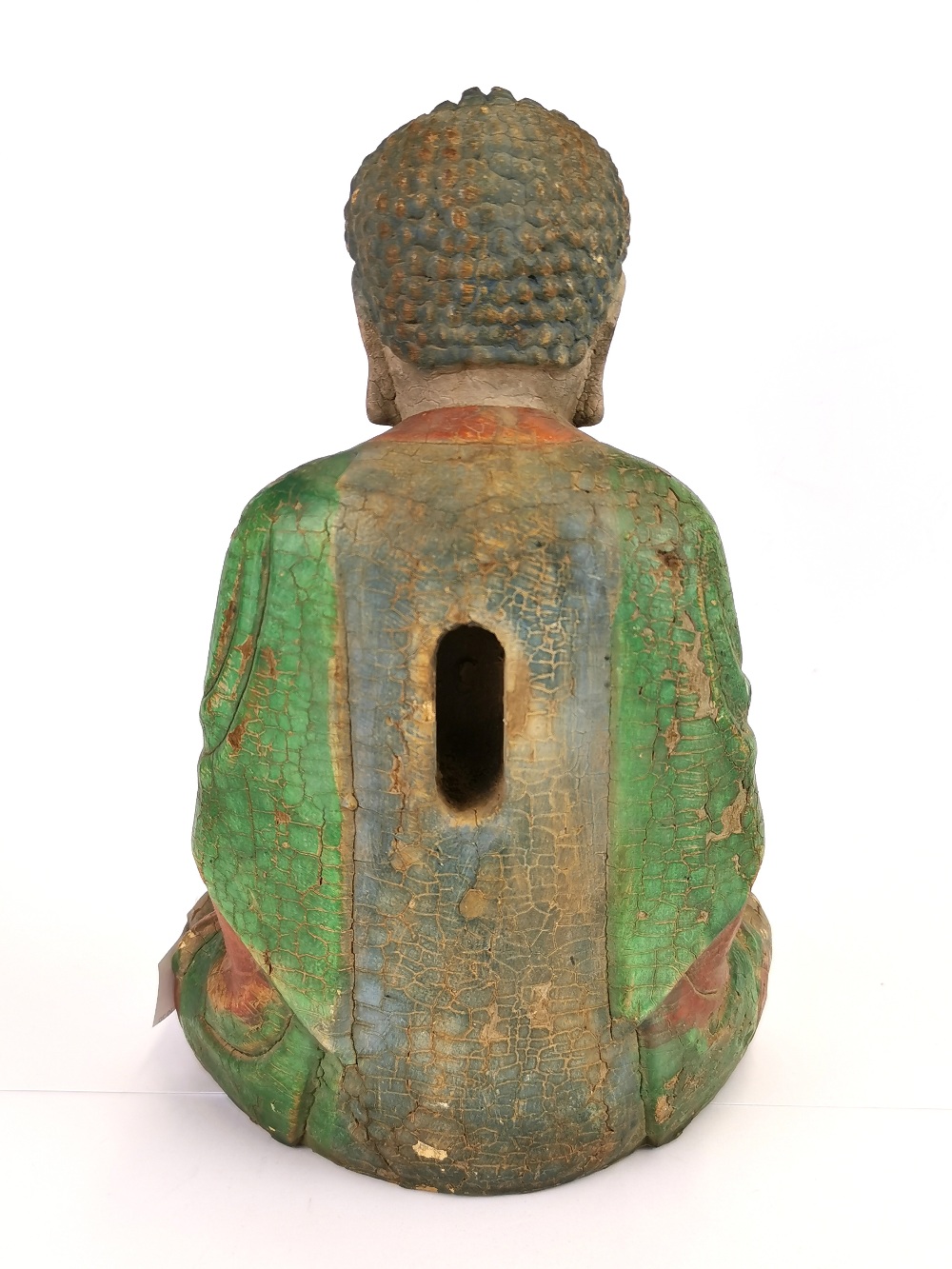 A Chinese painted carved wooden figure of a seated Buddha, H. 26cm. - Image 2 of 2