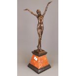 A large Art Deco style bronze figure of a woman on a marble base. H.56cms