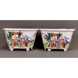 A pair of mid 20th Century Chinese hand painted porcelain plant pots, W. 22cm H. 13cm. One with