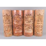 Four Chinese carved bamboo vases/brush pots, (one repaired), H. 32cm.