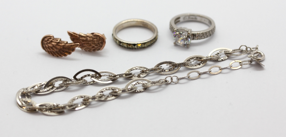 Two 925 silver rings, a silver bracelet and rose gold gilt silver pair of earrings. - Image 2 of 2