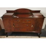 An interesting 1920's Ball and claw foot sideboard with lift up side panels originally designed to