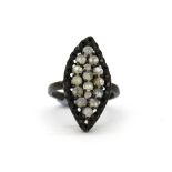 A 925 silver moonstone and black spinel ring, (O).