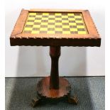 A pine pedestal chess table, 45 x 45 x 55cm.