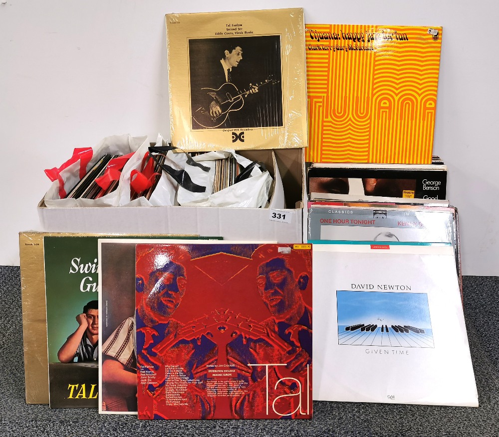 A large collection of jazz and swing 33 RPM LP records.