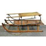 Two vintage sledges, longest 112cm.