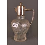 A lovely hallmarked silver and cut glass claret jug, H. 25cm.