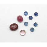 A quantity of unmounted cabochon cut sapphires and rubies, approx. 11.85ct.