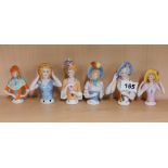 A group of six porcelain half dolls, tallest 9cm.