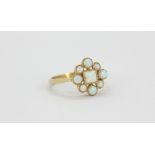 A 9ct yellow gold opal set ring, (N.5).