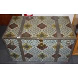 A large vintage metal and wood travelling trunk, 102 x 58 x 59cm.