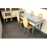 An Umberto Mascagni 1950's Oriental design dining table with four chairs and matching sideboard,