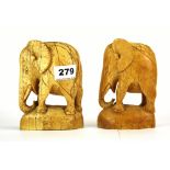 A pair of early 20th Century carved ivory elephant bookends, H. 13.5cm.