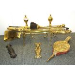 A pair of 19th Century brass fire dogs with companion set, bellows etc.