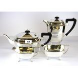 An impressive hallmarked silver four piece tea set, approx. 1825g.