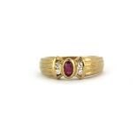 A 9ct yellow gold (stamped 9ct) ruby and diamond set ring, (L).