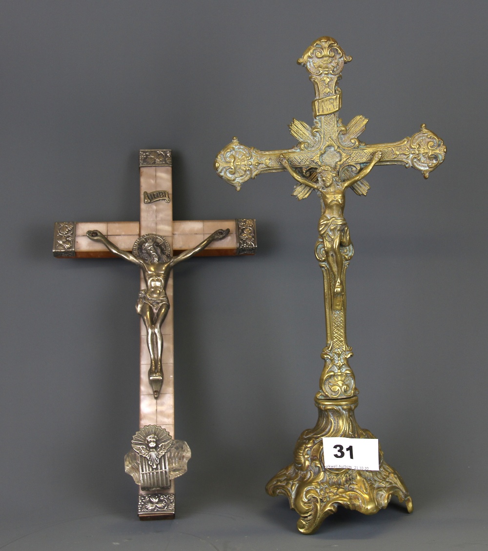 Two early 20th Century crucifixes, tallest 32cm.