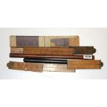A group of vintage rulers.