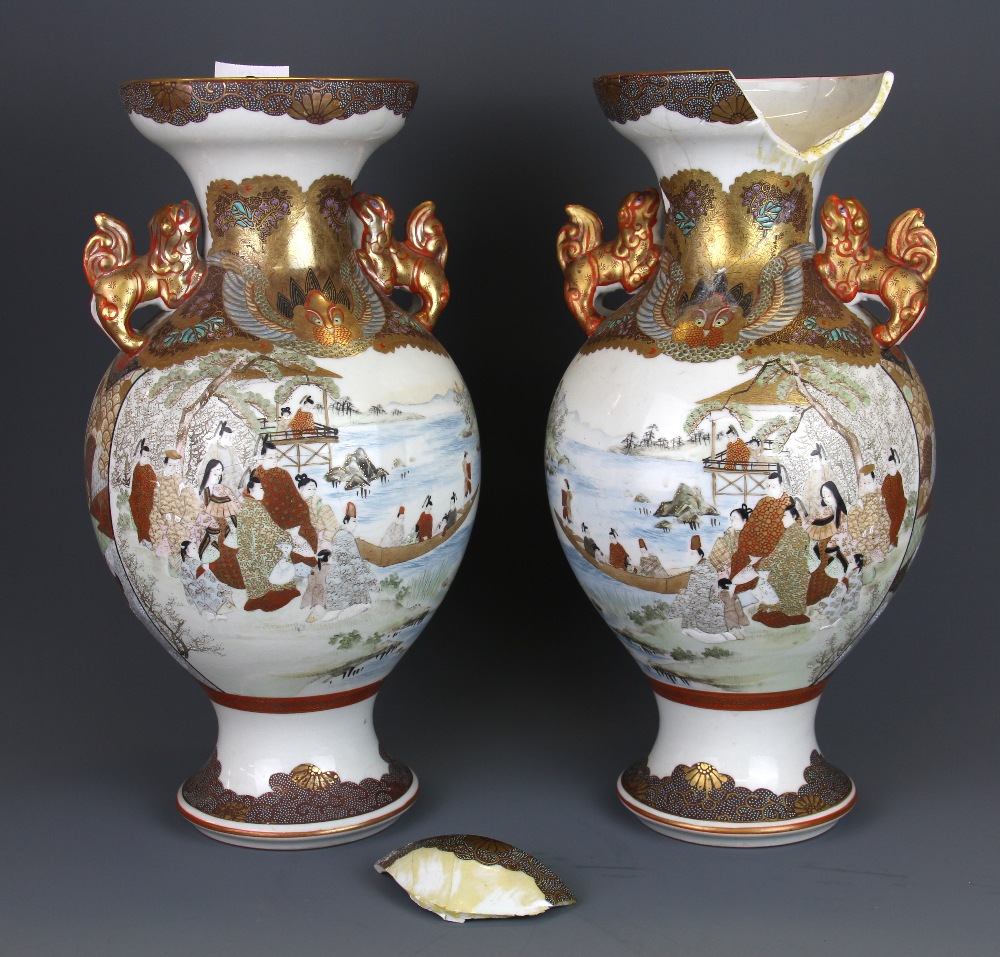 A pair of fine 19th Century Japanese hand painted and gilt Kutani porcelain vases, H. 37cm, (both