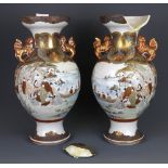 A pair of fine 19th Century Japanese hand painted and gilt Kutani porcelain vases, H. 37cm, (both