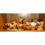 A Japanese hand painted porcelain tea and coffee set with tray, (one coffee cup A/F).