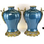 A pair of large Continental ormolu mounted crackle glazed porcelain vases, H. 49.5cm.