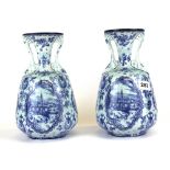 A pair of early 20th Century Continental Delft style porcelain vases, H. 26cm, no visible damage