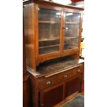 A Victorian oak kitchen cabinet with pull out work surface and sliding drawers to base, W. 123cm, H.