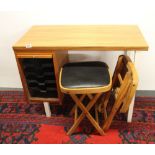 A small 1960's teak desk with filing cupboard, 91 x 46 x 69cm, together with two folding stools.