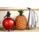 A 1960's pineapple ice bucket, a soda syphon and a chrome backing flask.
