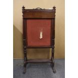 A 19th Century mahogany fire screen, H. 90cm.